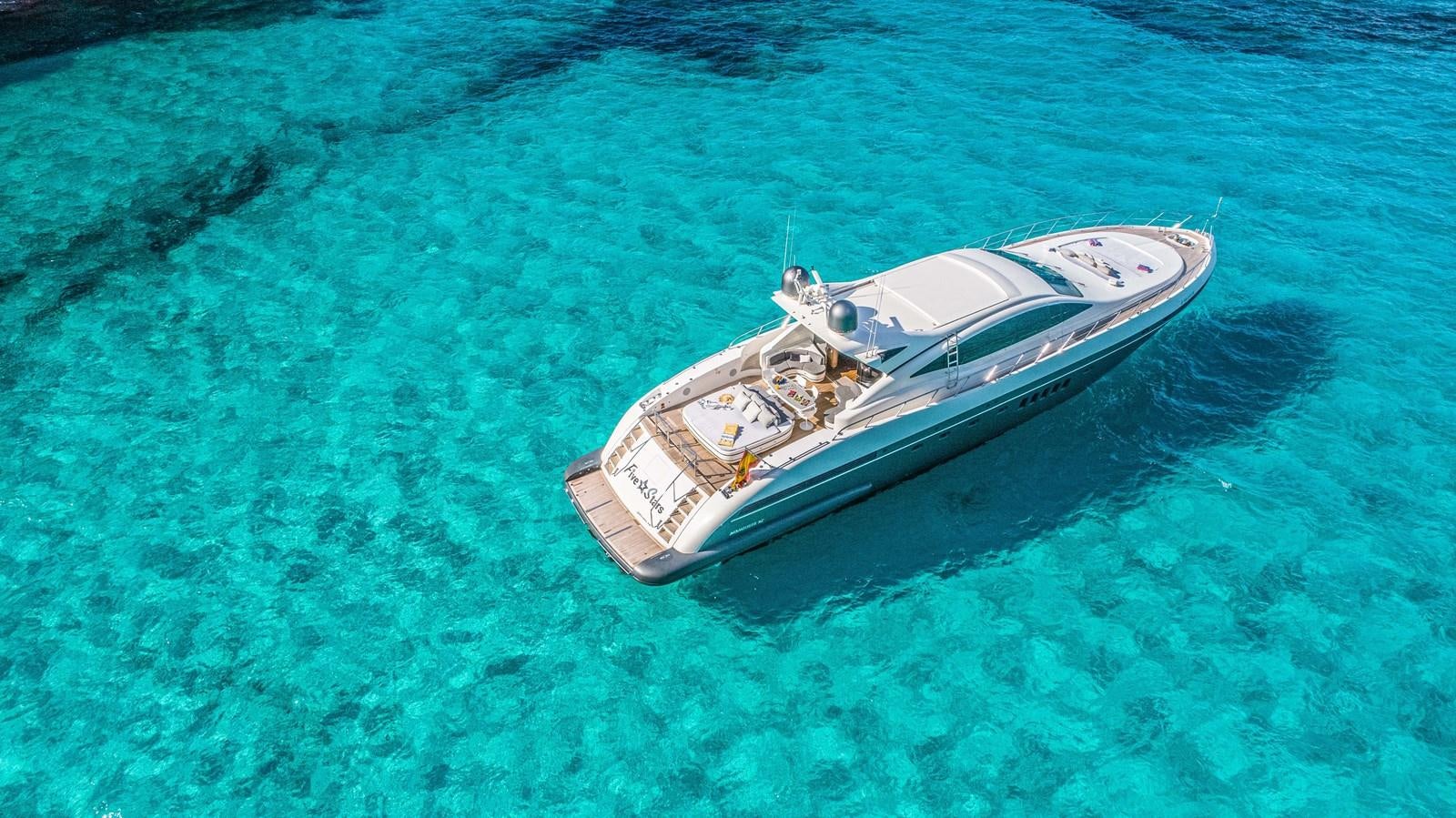 a boat on the water aboard FIVE STARS Yacht for Sale