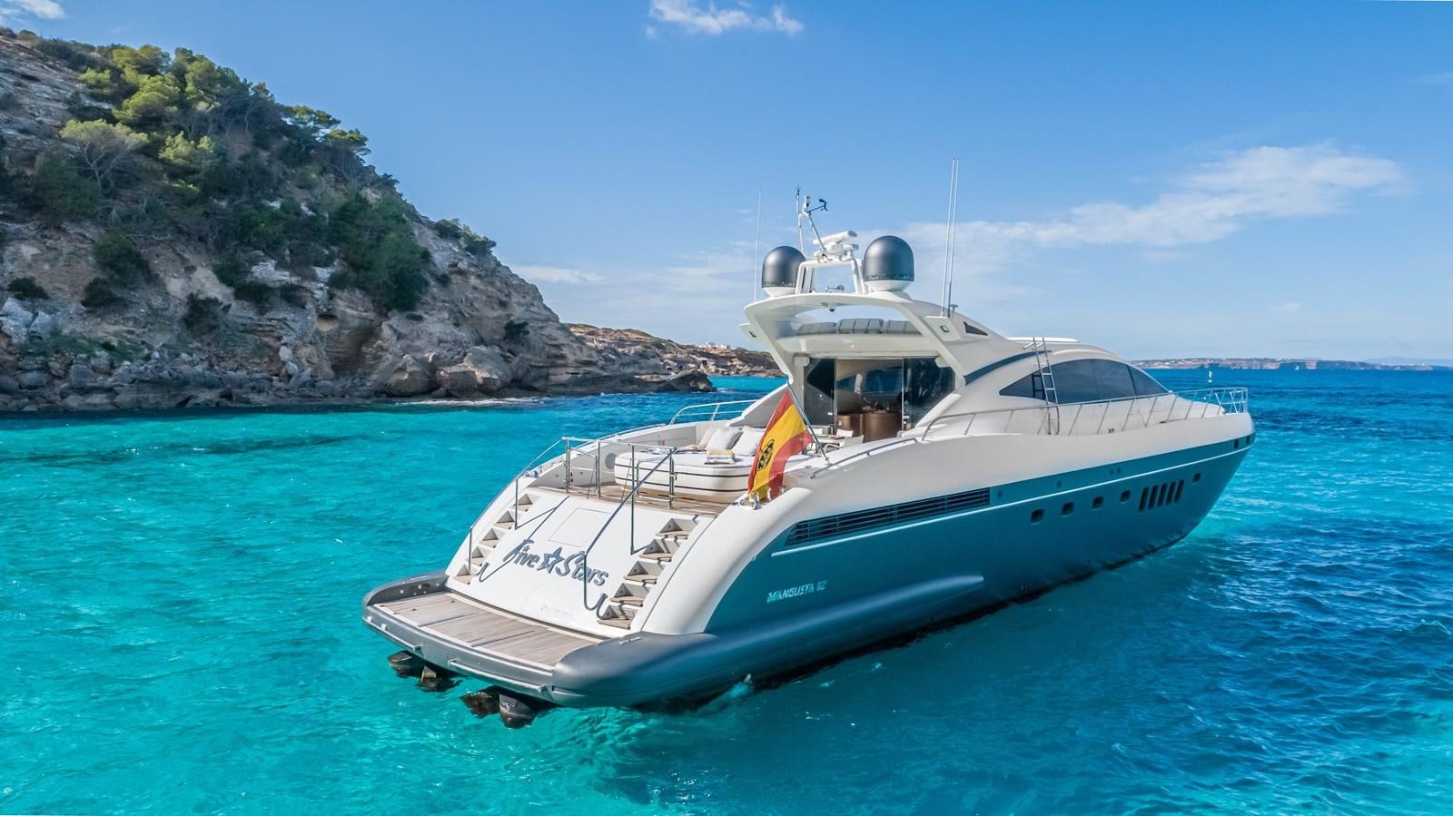 a boat in the water aboard FIVE STARS Yacht for Sale