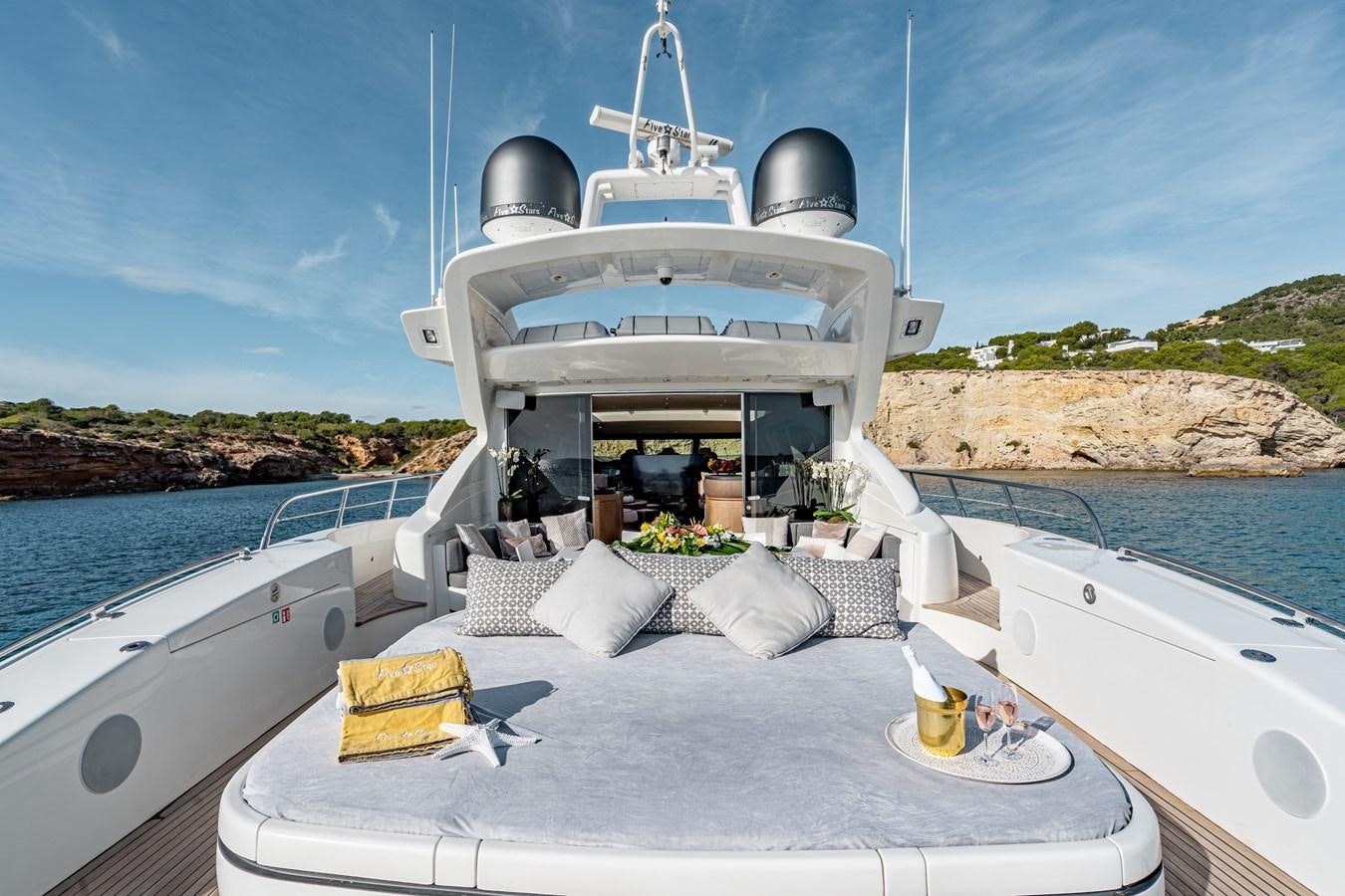a boat with a white sail aboard FIVE STARS Yacht for Sale