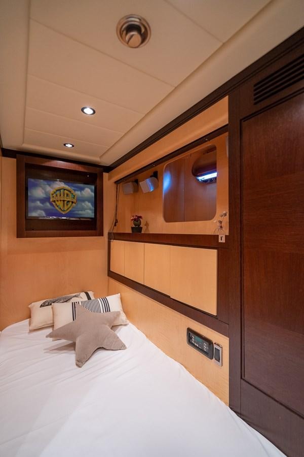 a bed in a room aboard FIVE STARS Yacht for Sale