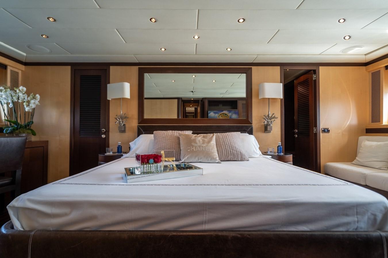 a large bed in a hotel room aboard FIVE STARS Yacht for Sale