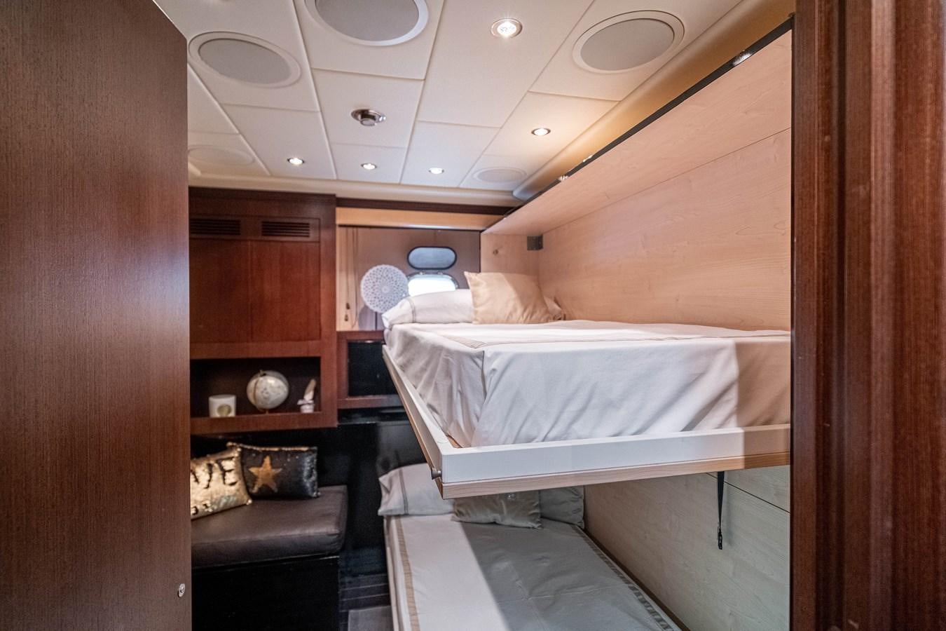 a couple of beds in a room aboard FIVE STARS Yacht for Sale