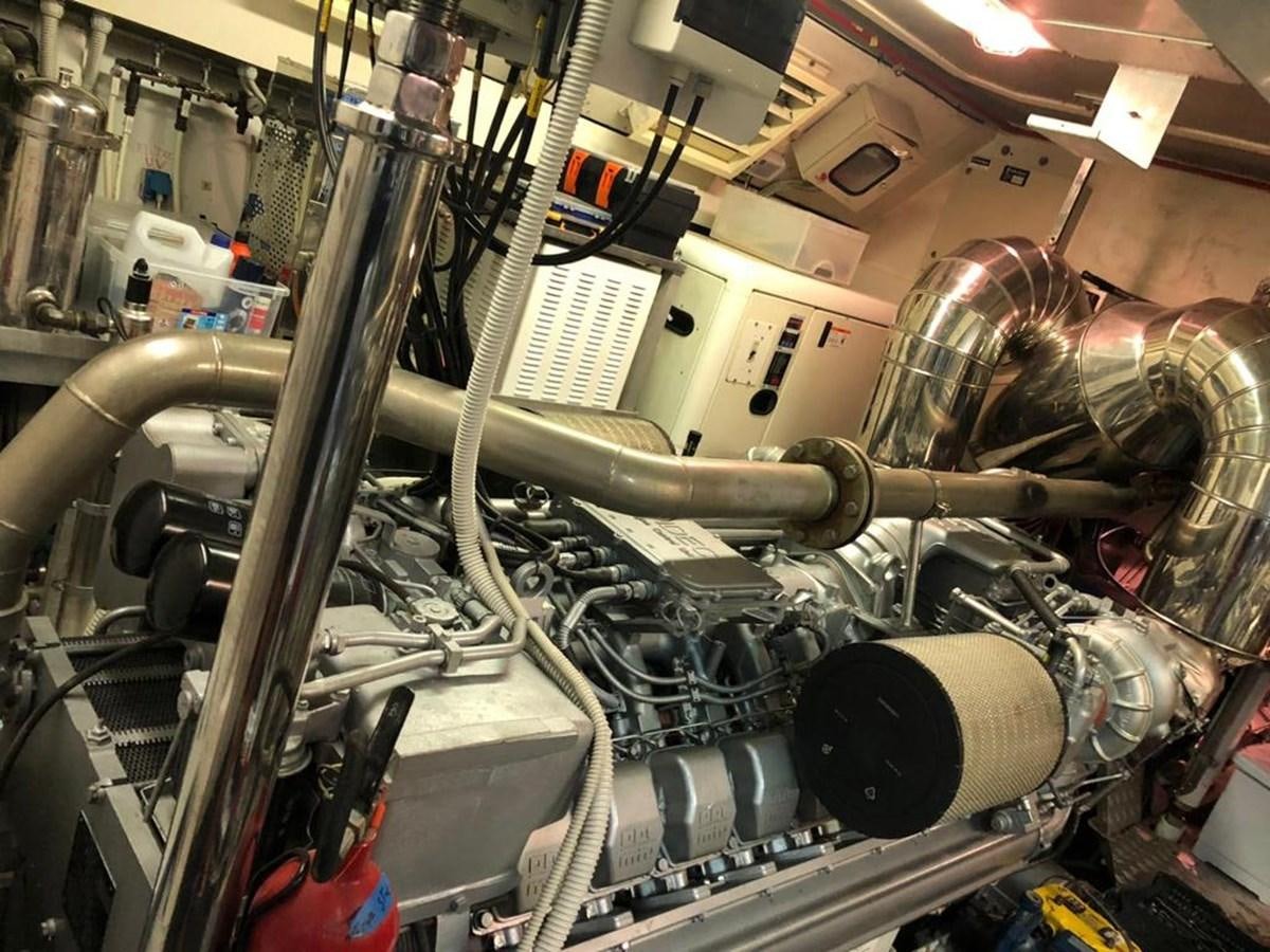 a machine with a large metal cylinder aboard FIVE STARS Yacht for Sale