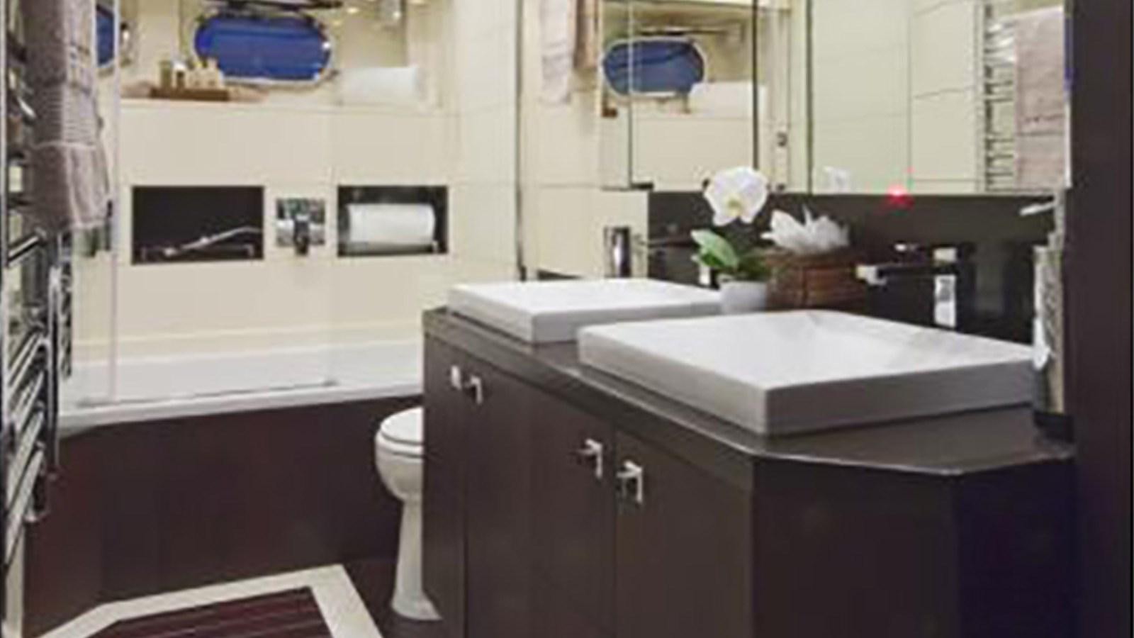 a bathroom with a sink and a toilet aboard ASHA Yacht for Sale