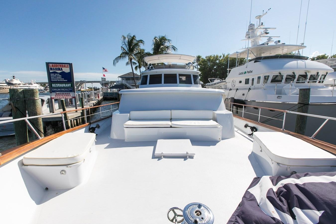 a group of boats are parked at a dock aboard TRES HERMANOS VI Yacht for Sale