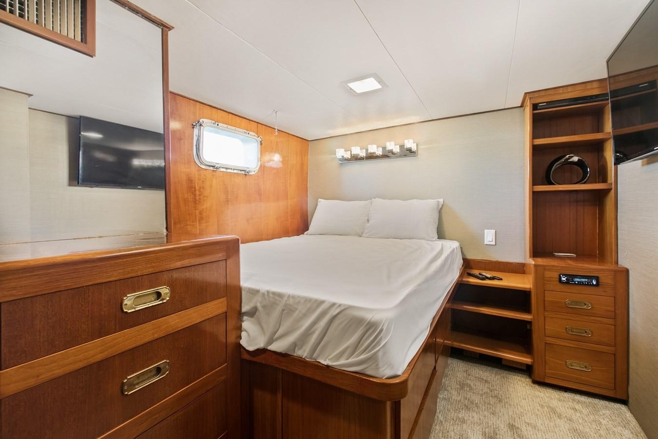 a room with two beds aboard TRES HERMANOS VI Yacht for Sale