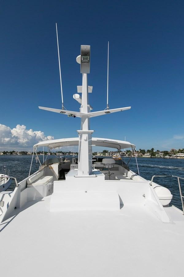 a white wind turbine on a boat aboard TRES HERMANOS VI Yacht for Sale