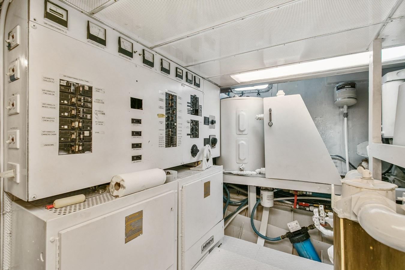 a room with white cabinets and white cabinets aboard TRES HERMANOS VI Yacht for Sale