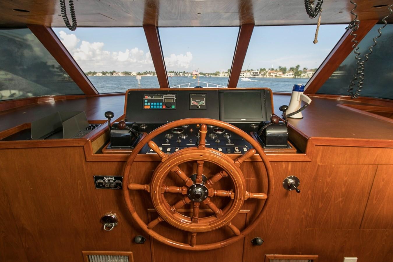 the inside of a vehicle aboard TRES HERMANOS VI Yacht for Sale