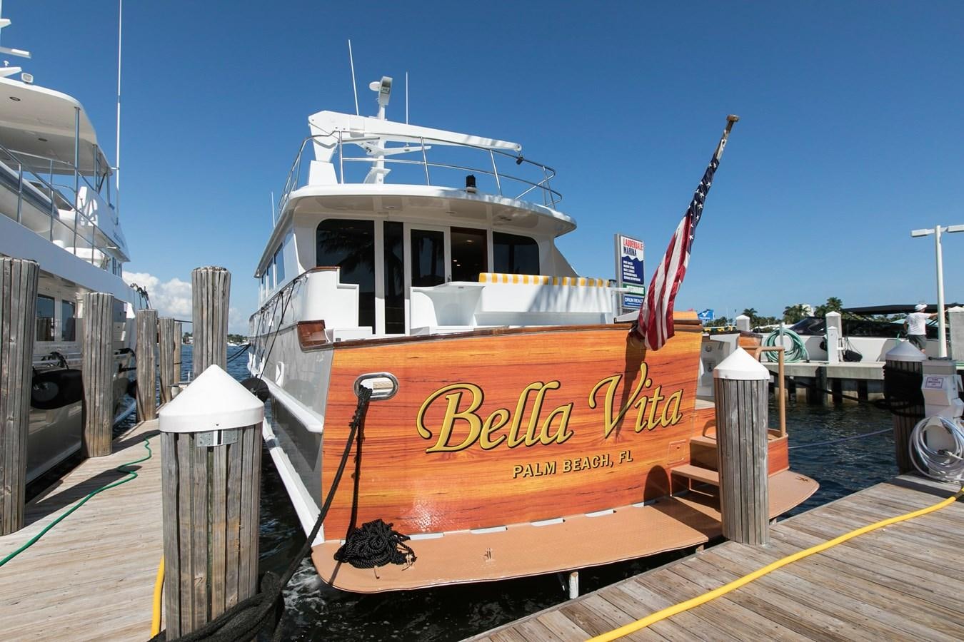 a boat on a dock aboard TRES HERMANOS VI Yacht for Sale