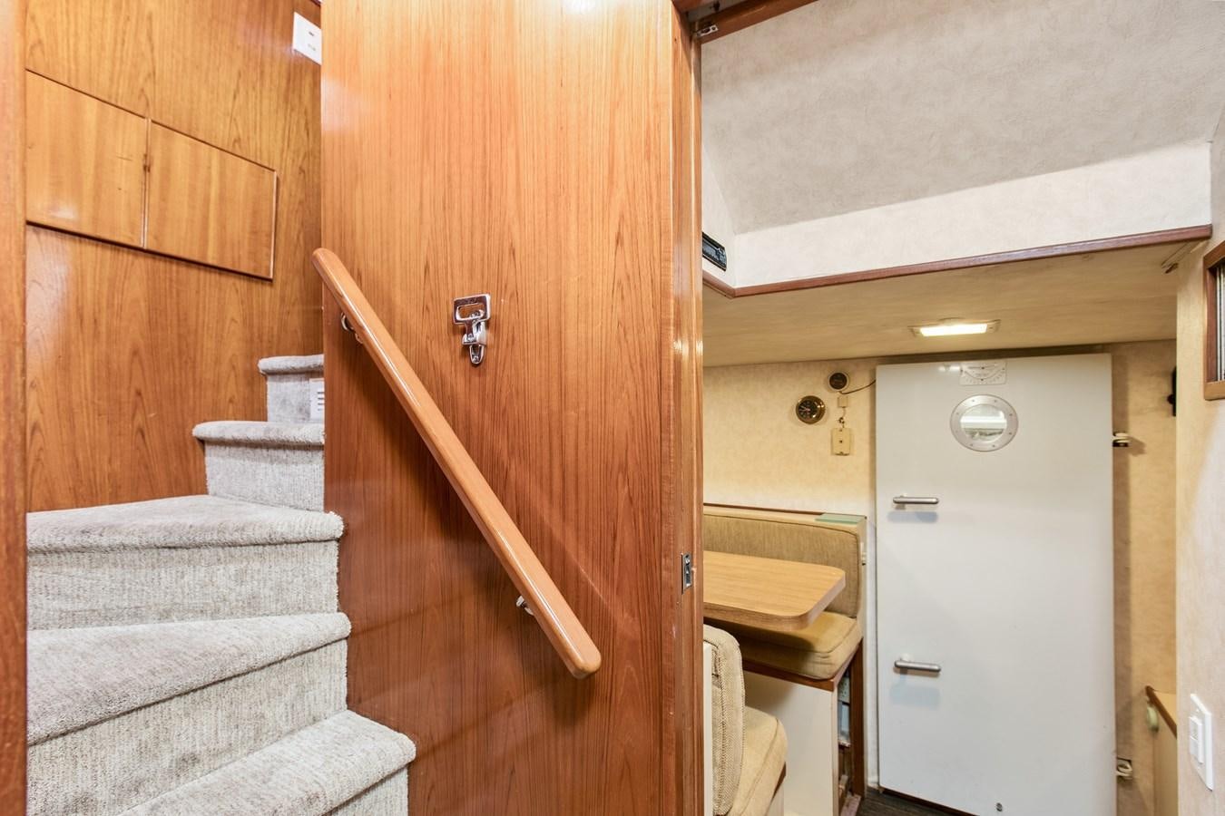 a staircase in a house aboard TRES HERMANOS VI Yacht for Sale