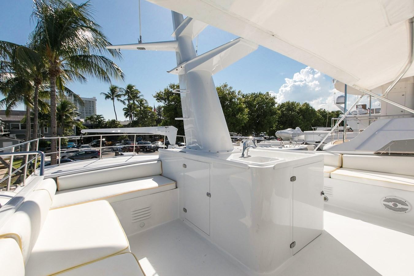 a large white building with a large white structure and a pool aboard TRES HERMANOS VI Yacht for Sale