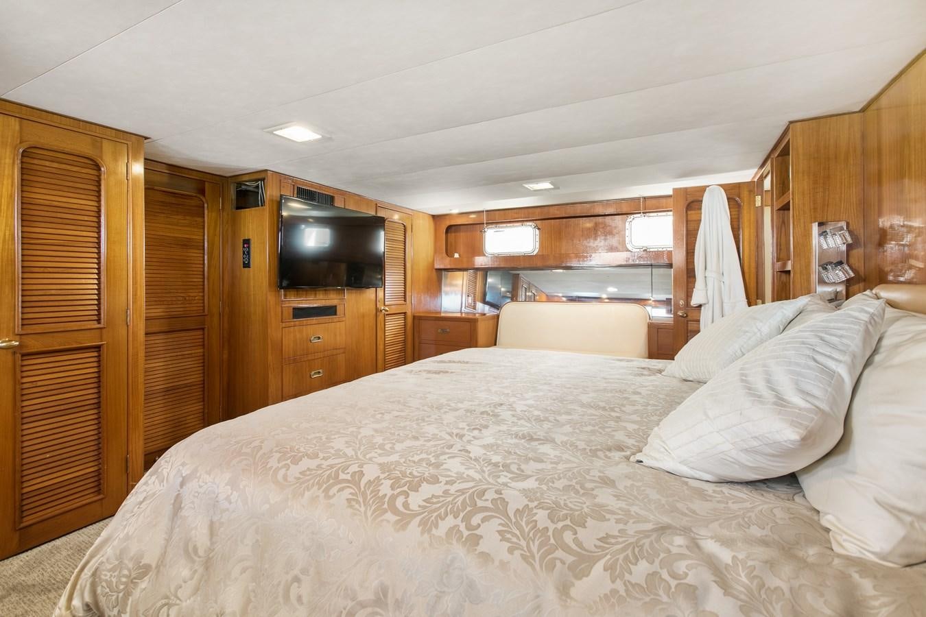 a bed in a cabin aboard TRES HERMANOS VI Yacht for Sale