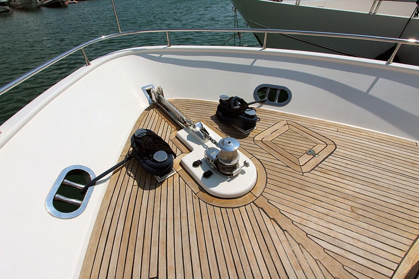 a deck with a deck and a pool aboard HAIGAN Yacht for Sale