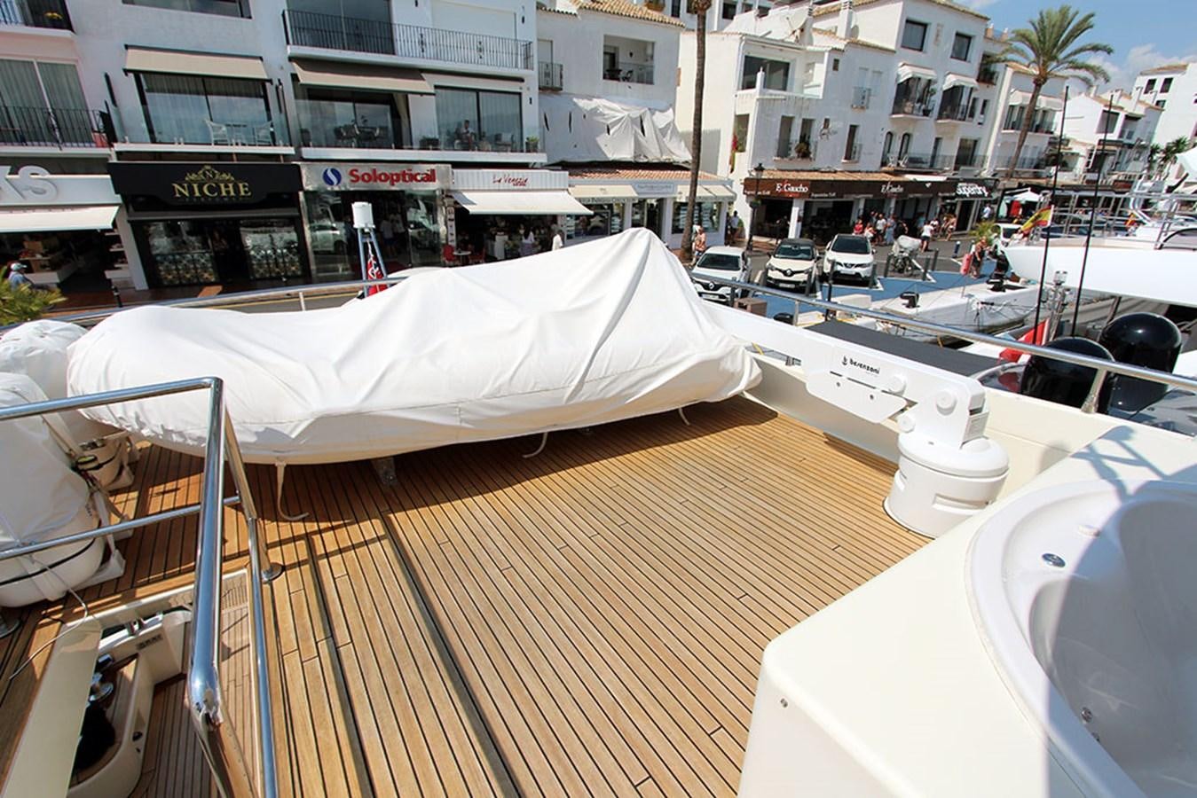 a covered table on a deck aboard HAIGAN Yacht for Sale