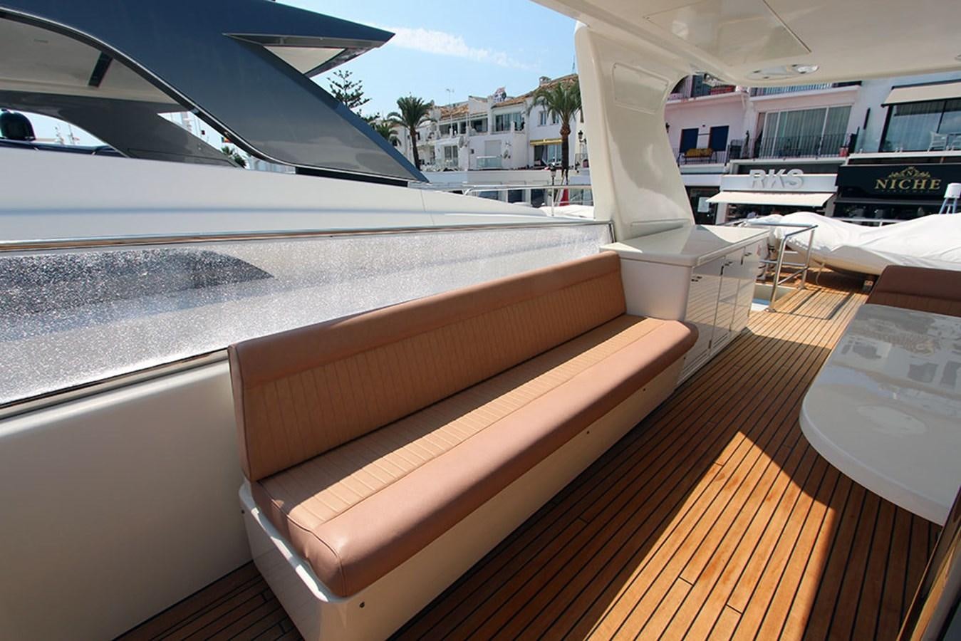a deck with a deck and a boat on it aboard HAIGAN Yacht for Sale