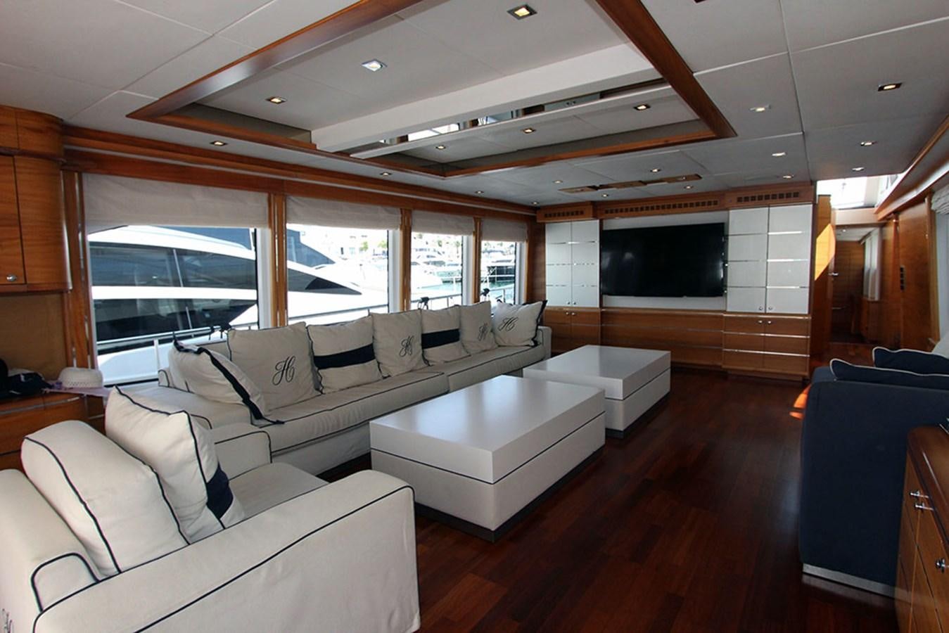 a living room with a large window aboard HAIGAN Yacht for Sale