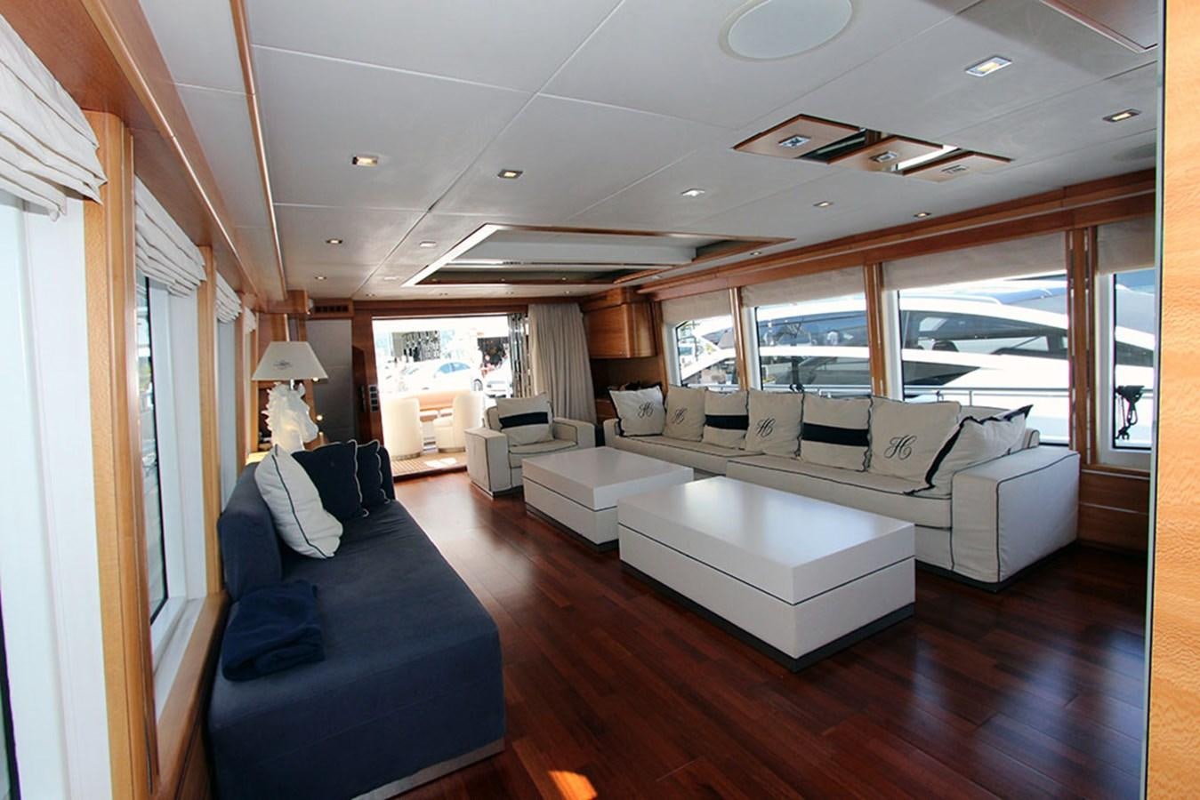 a living room with a large window aboard HAIGAN Yacht for Sale