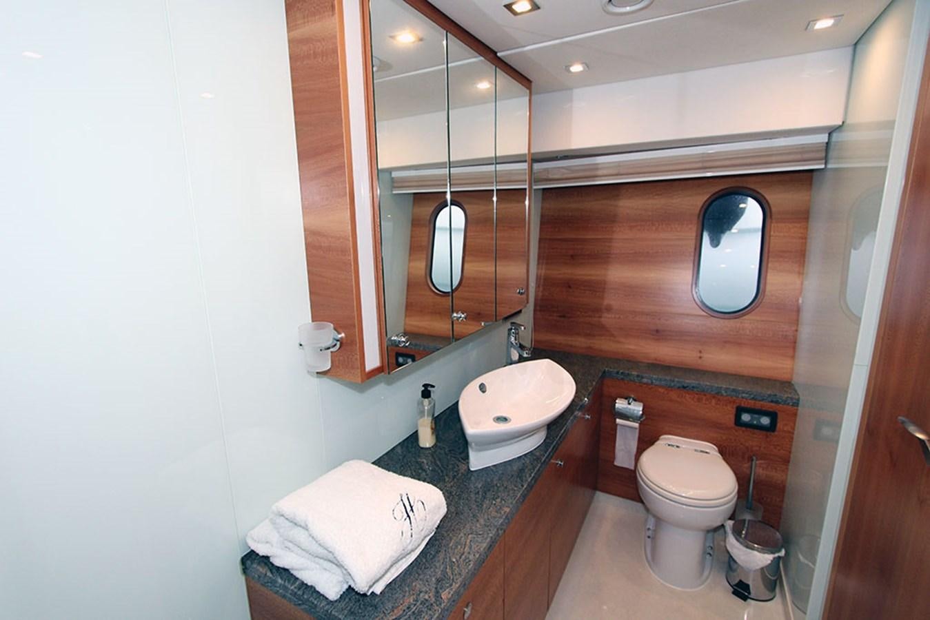 a bathroom with a sink and a toilet aboard HAIGAN Yacht for Sale