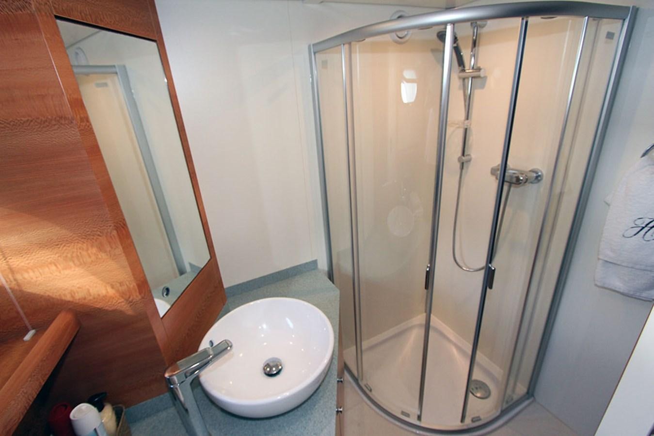 a shower unit in a bathroom aboard HAIGAN Yacht for Sale