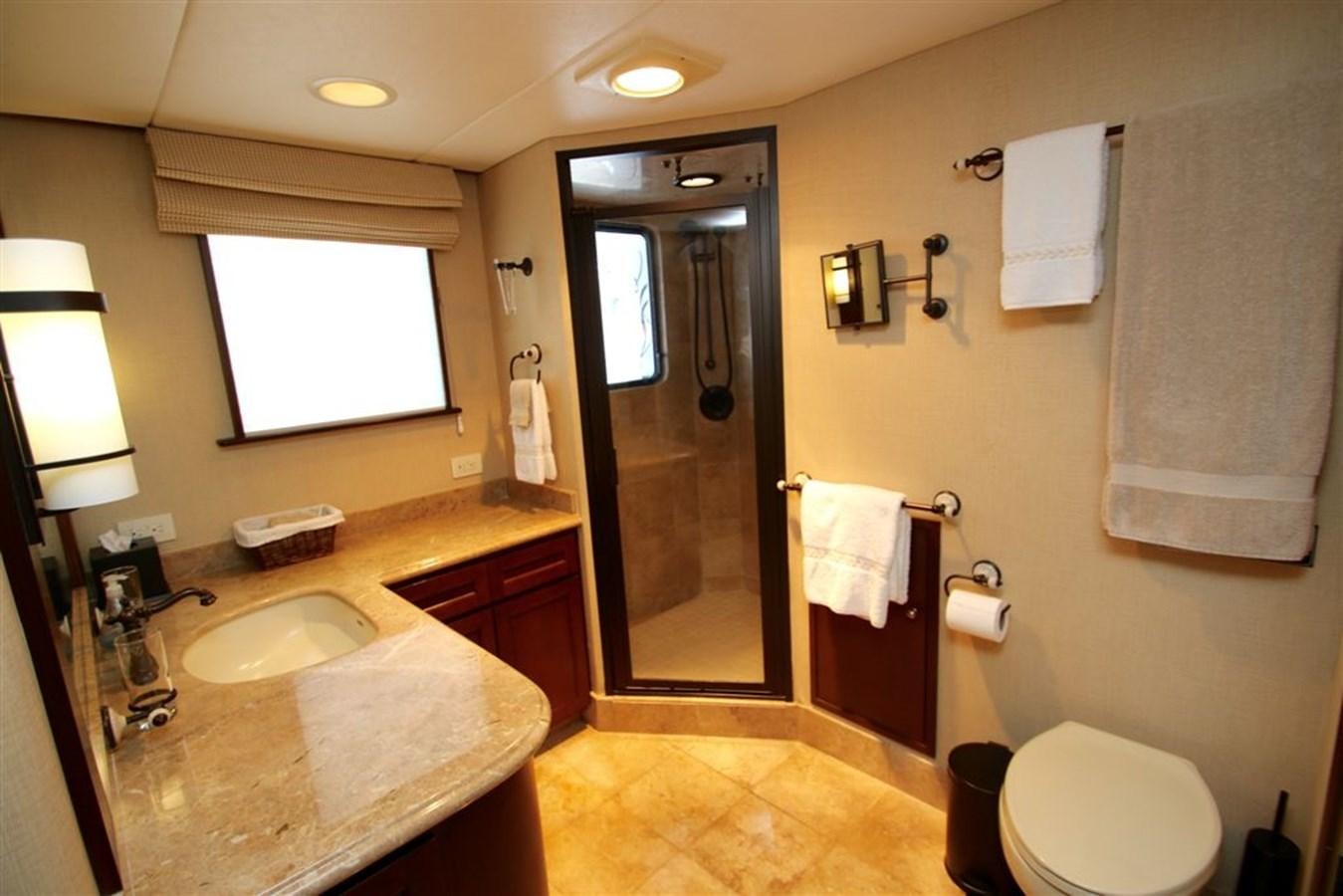 a bathroom with a sink and toilet aboard ROSA Yacht for Sale