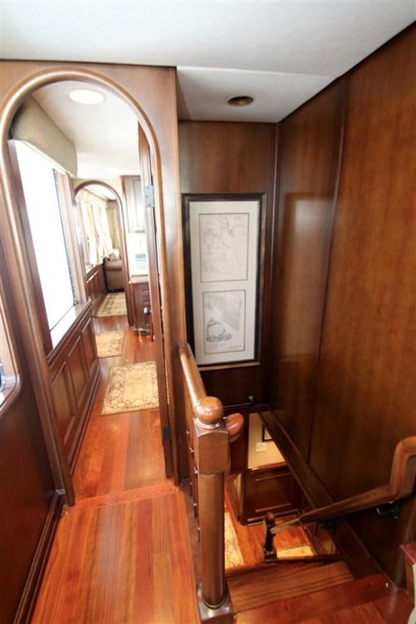 a hallway with wood floors aboard ROSA Yacht for Sale