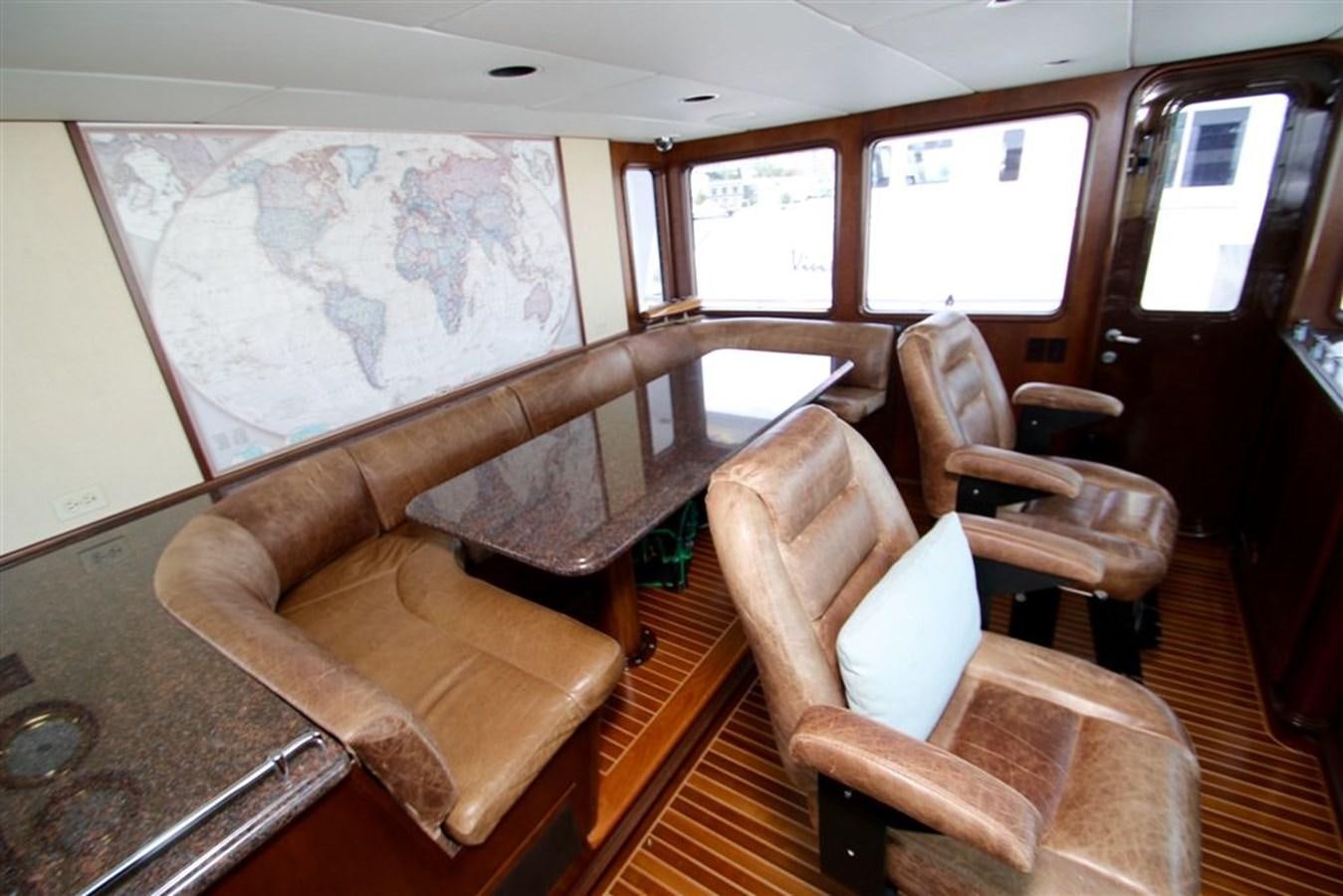 a train with leather seats aboard ROSA Yacht for Sale