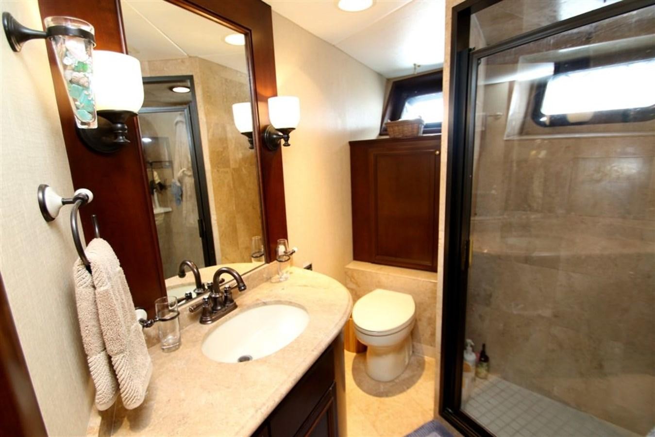 a bathroom with a sink and toilet aboard ROSA Yacht for Sale