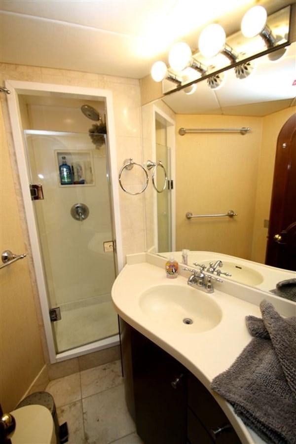 a bathroom with a sink and a mirror aboard ROSA Yacht for Sale