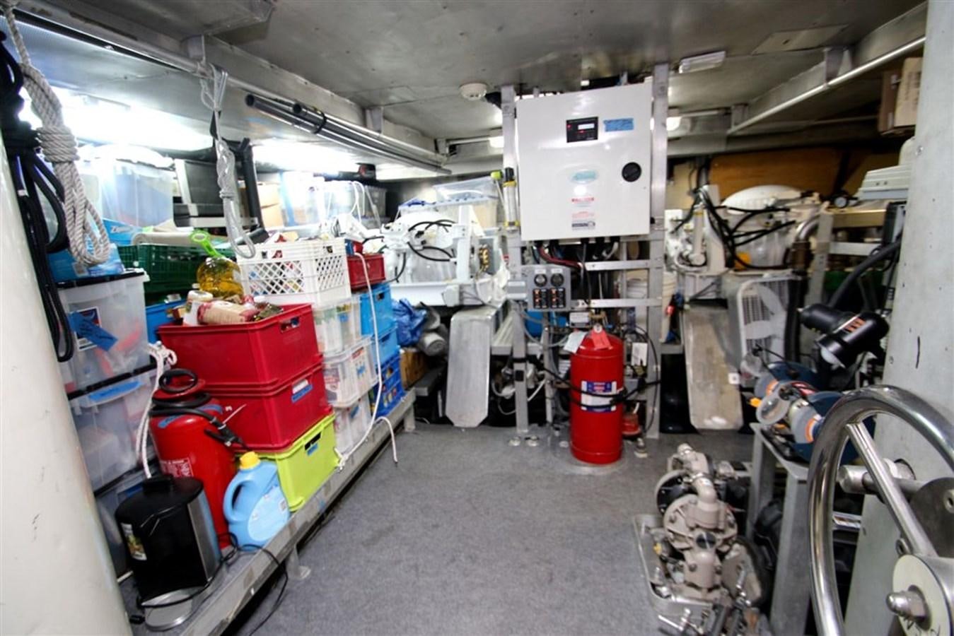 a room with many objects in it aboard ROSA Yacht for Sale