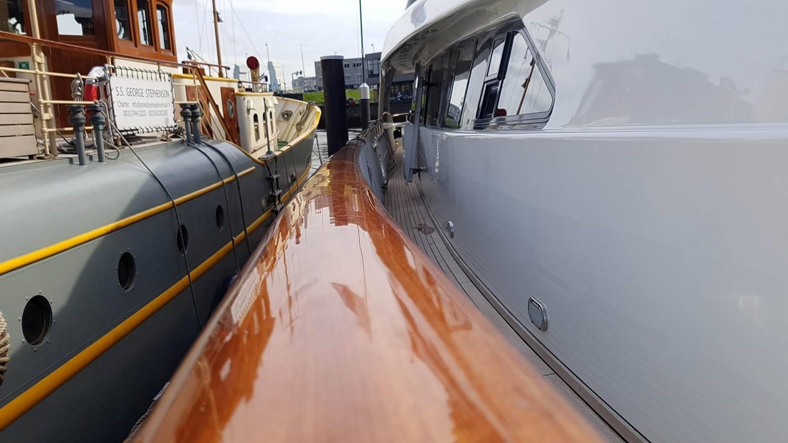 a train on the railway tracks aboard LADY MIKKI Yacht for Sale