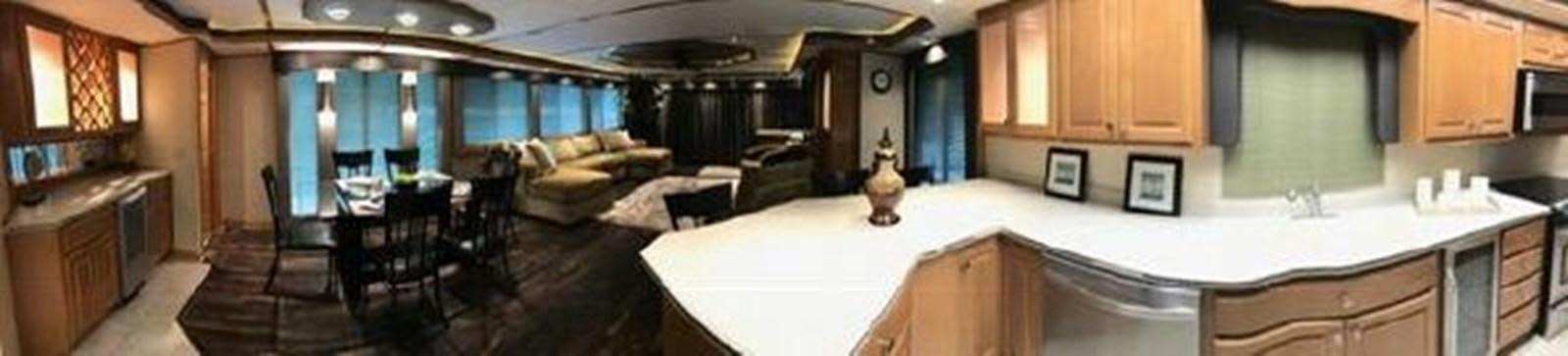 a kitchen with a large island aboard FANTASY HOUSEBOAT Yacht for Sale