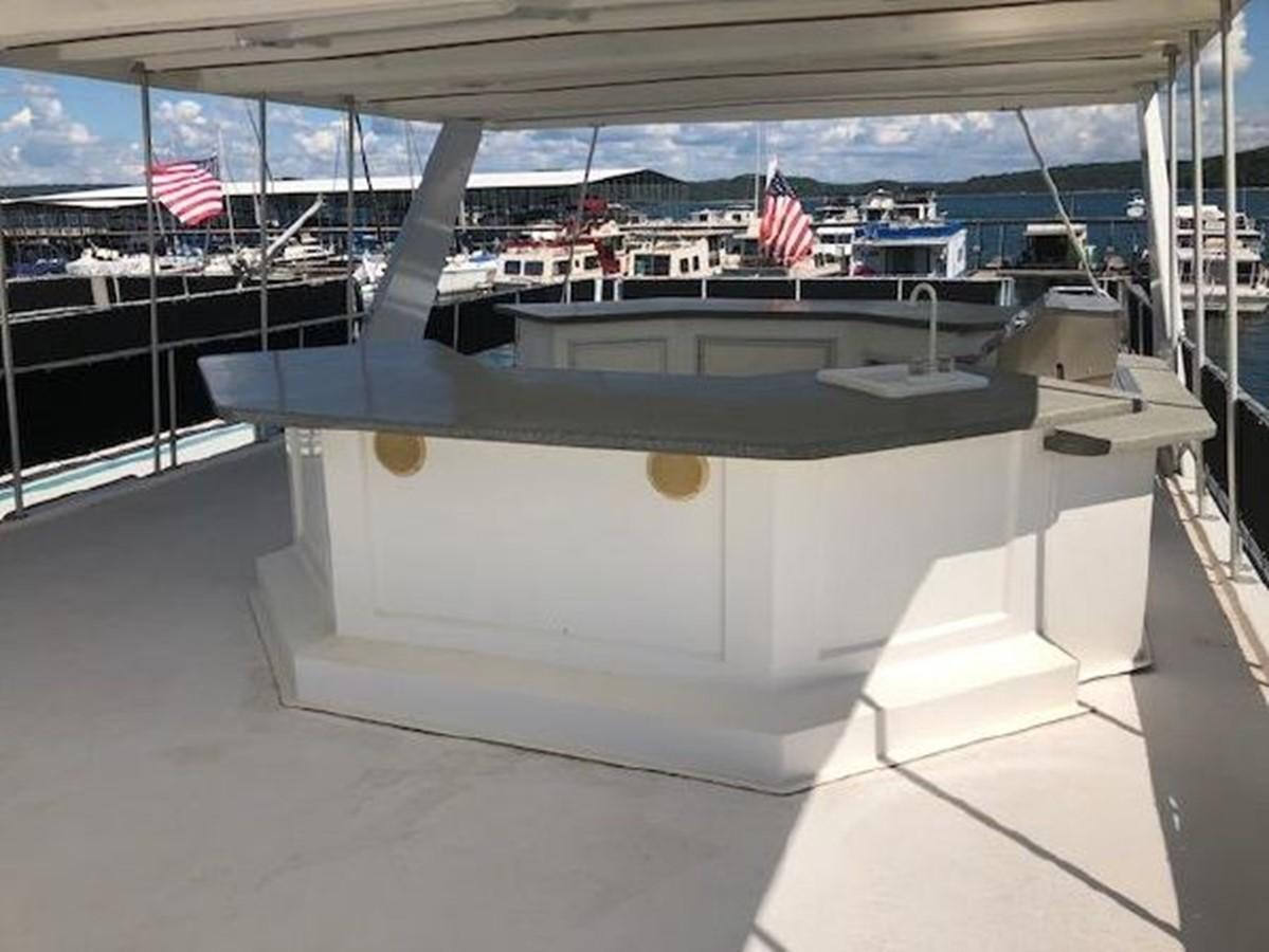 a large pool table aboard FANTASY HOUSEBOAT Yacht for Sale