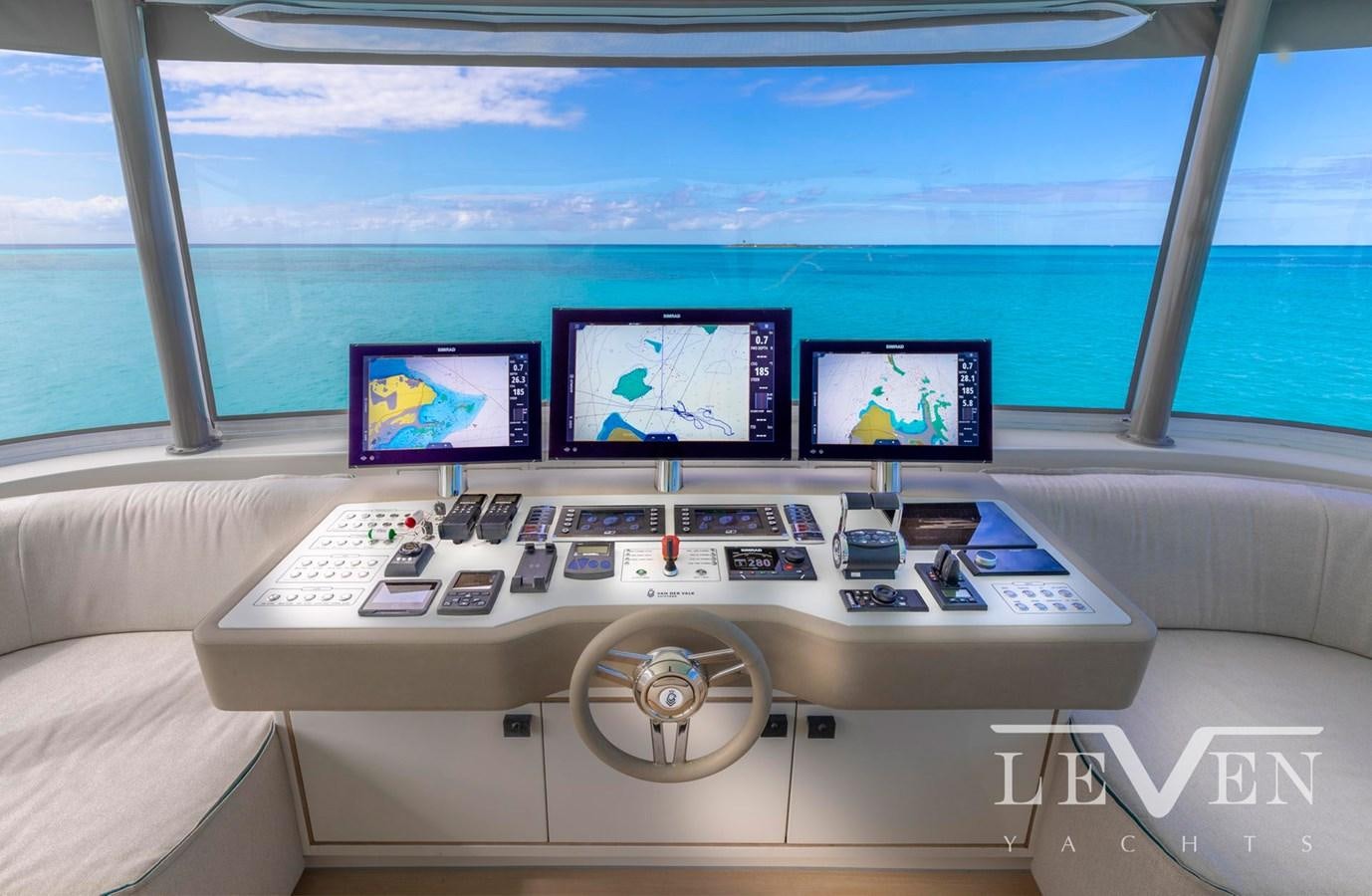 a control panel with several monitors aboard LEVEN 90 Yacht for Sale