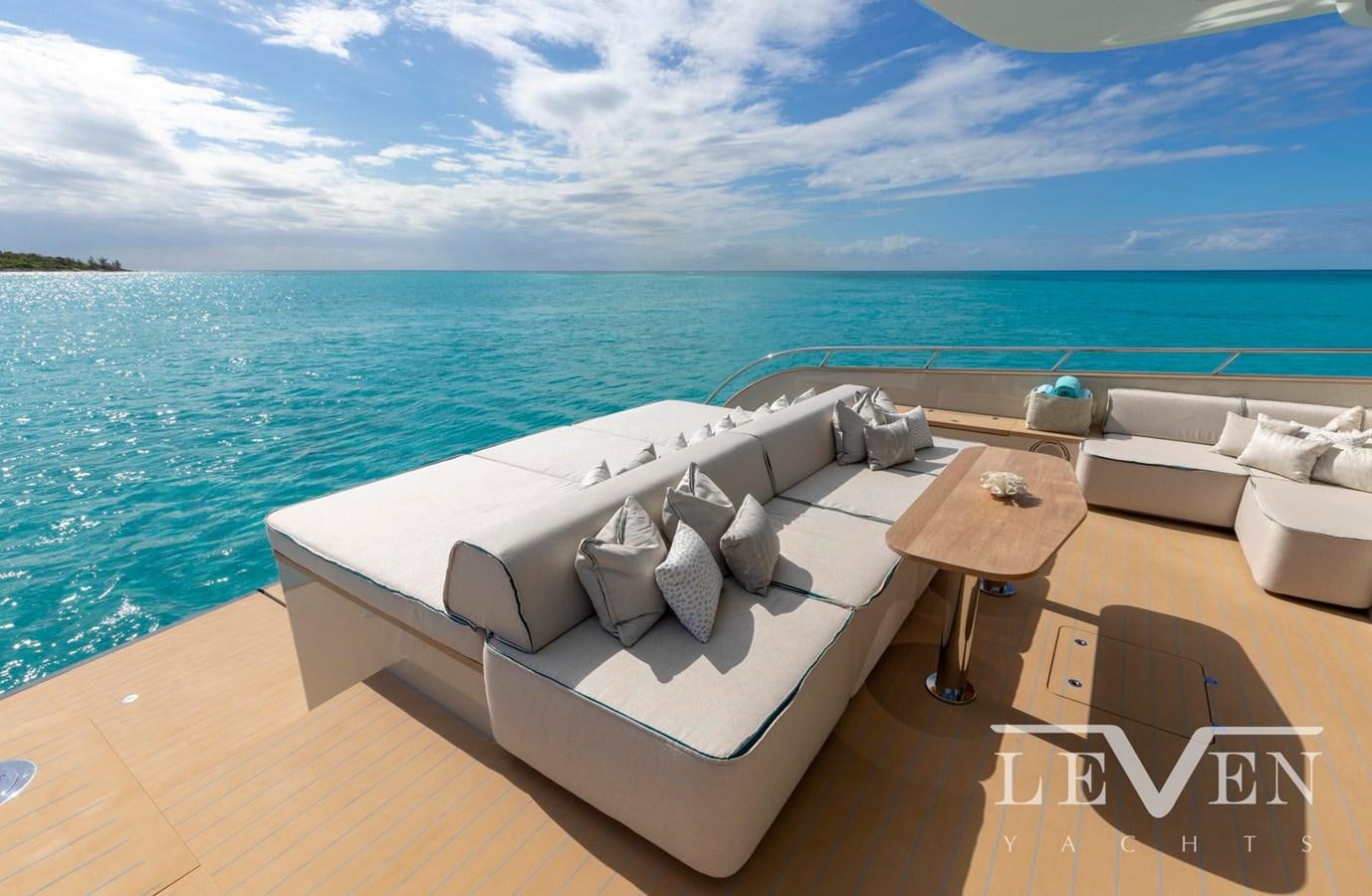 a lounge chair on a boat aboard LEVEN 90 Yacht for Sale