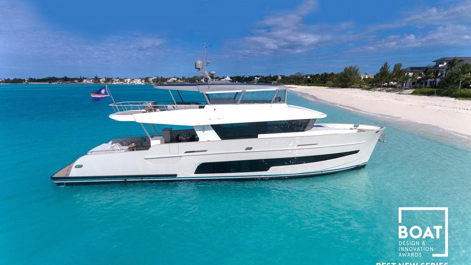 a white boat on a blue body of water aboard LEVEN 90 Yacht for Sale