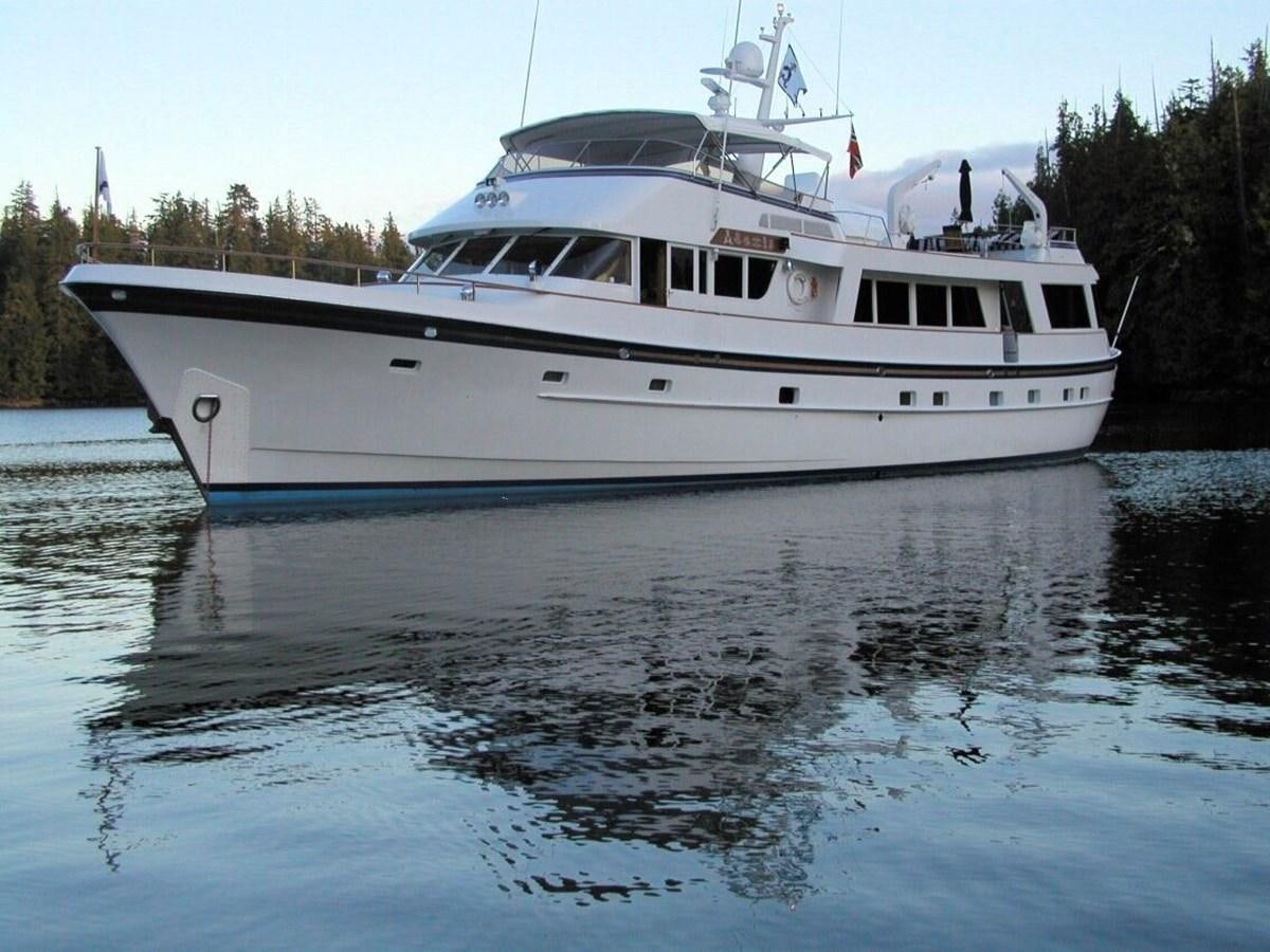 a white yacht on the water aboard ALEXIS Yacht for Sale