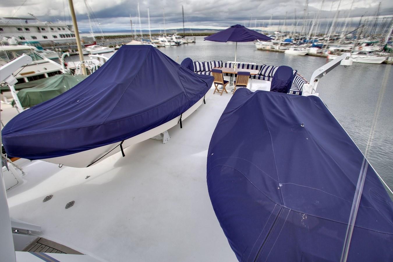 a couple of umbrellas on a boat aboard ALEXIS Yacht for Sale