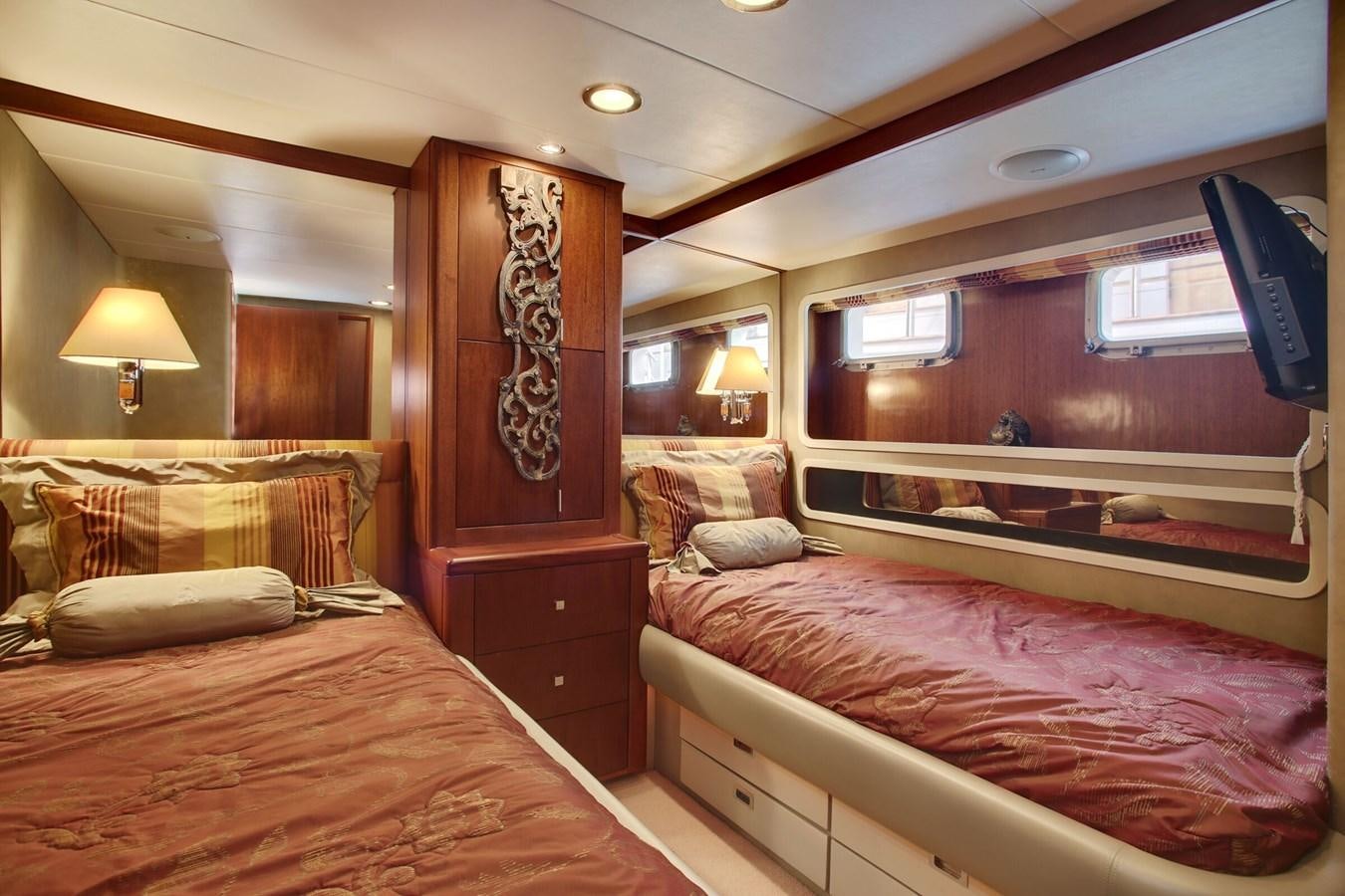 a room with two beds aboard ALEXIS Yacht for Sale