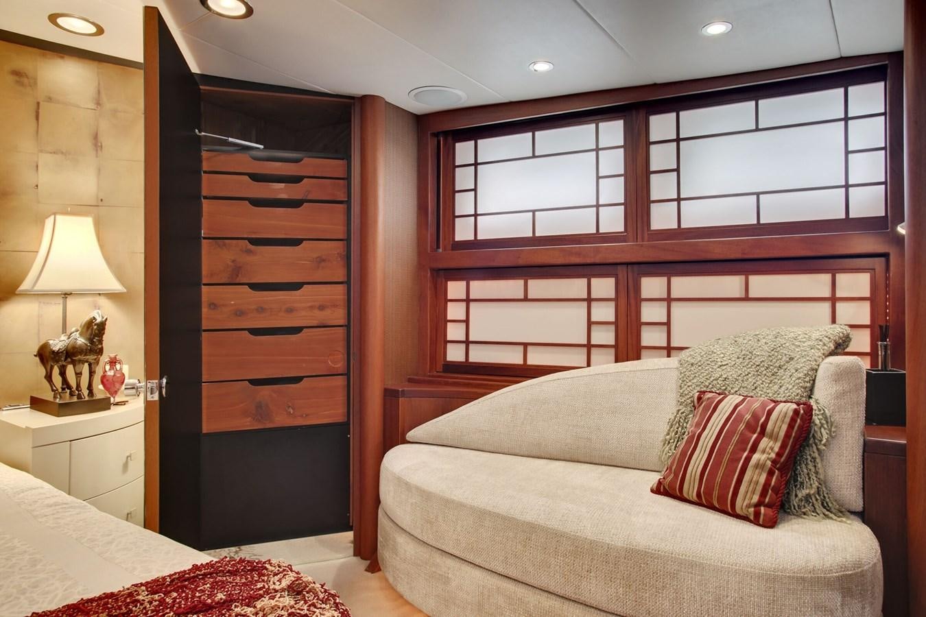 a room with a bed and a couch aboard ALEXIS Yacht for Sale