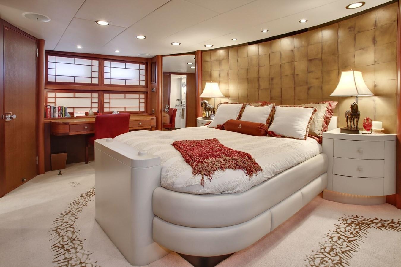 a large bed in a hotel room aboard ALEXIS Yacht for Sale