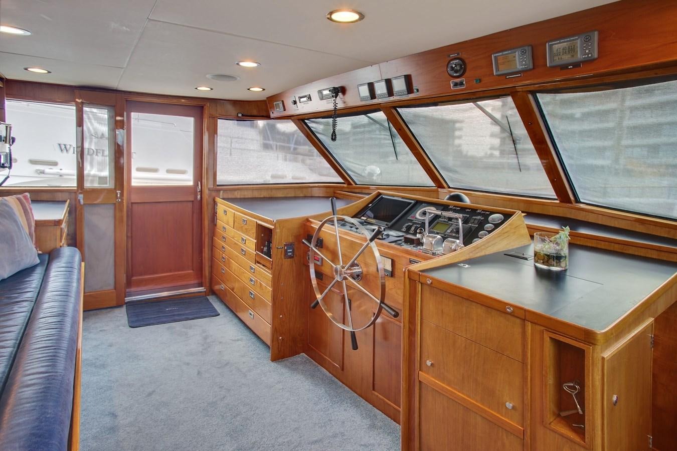 a room with a table and chairs aboard ALEXIS Yacht for Sale
