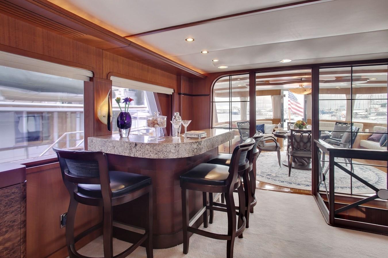 a dining room with a table and chairs aboard ALEXIS Yacht for Sale