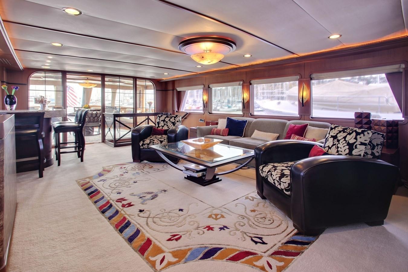 a living room with a large rug aboard ALEXIS Yacht for Sale