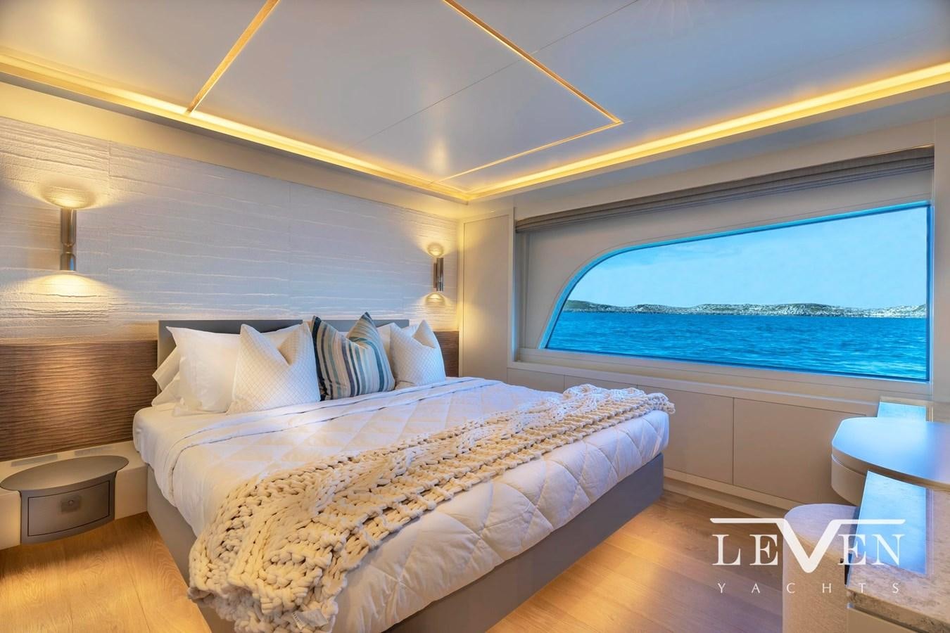 a large bed in a room aboard LEVEN 90 LV01 Yacht for Sale
