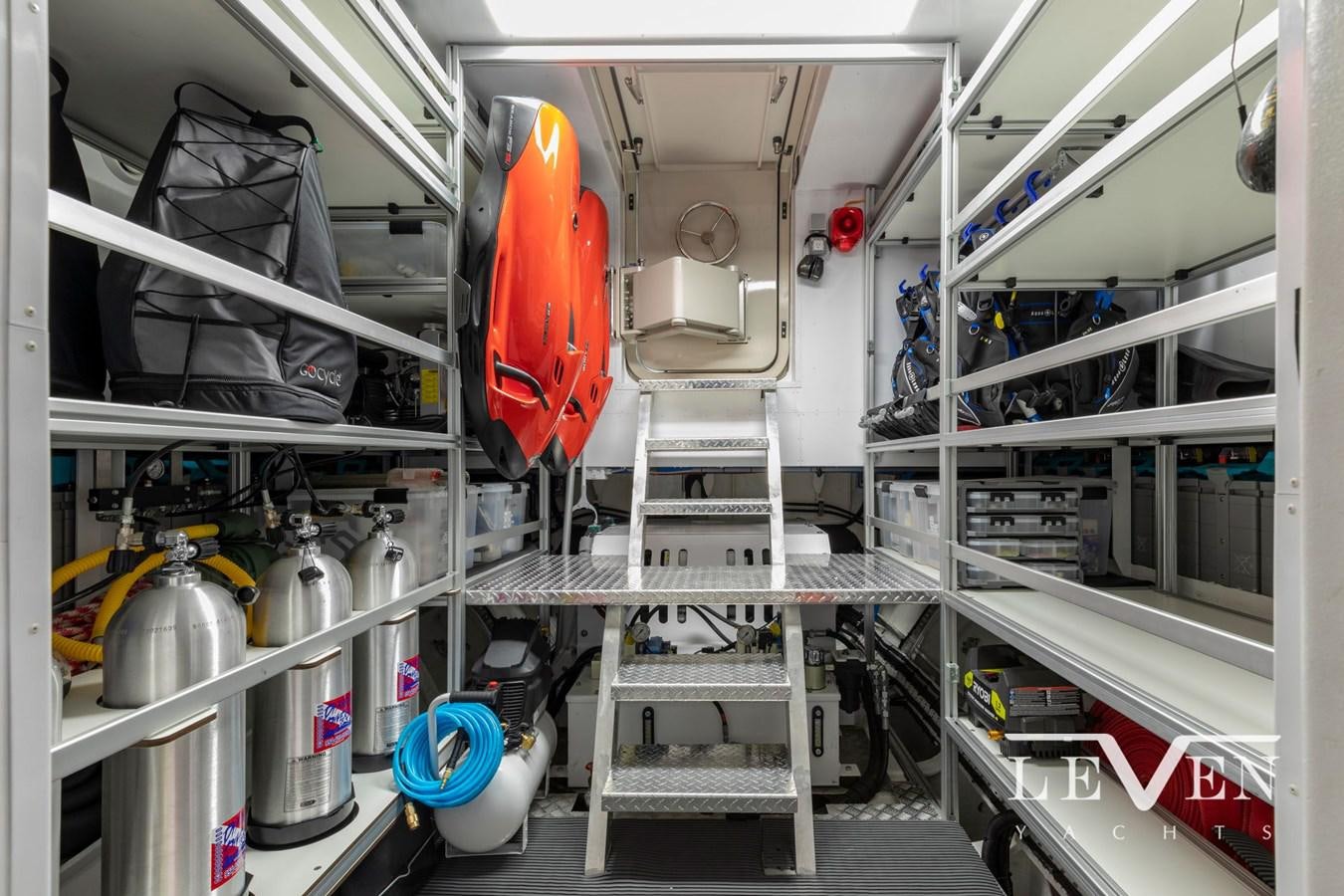 a large white machine with a red circle in the middle aboard LEVEN 90 LV01 Yacht for Sale