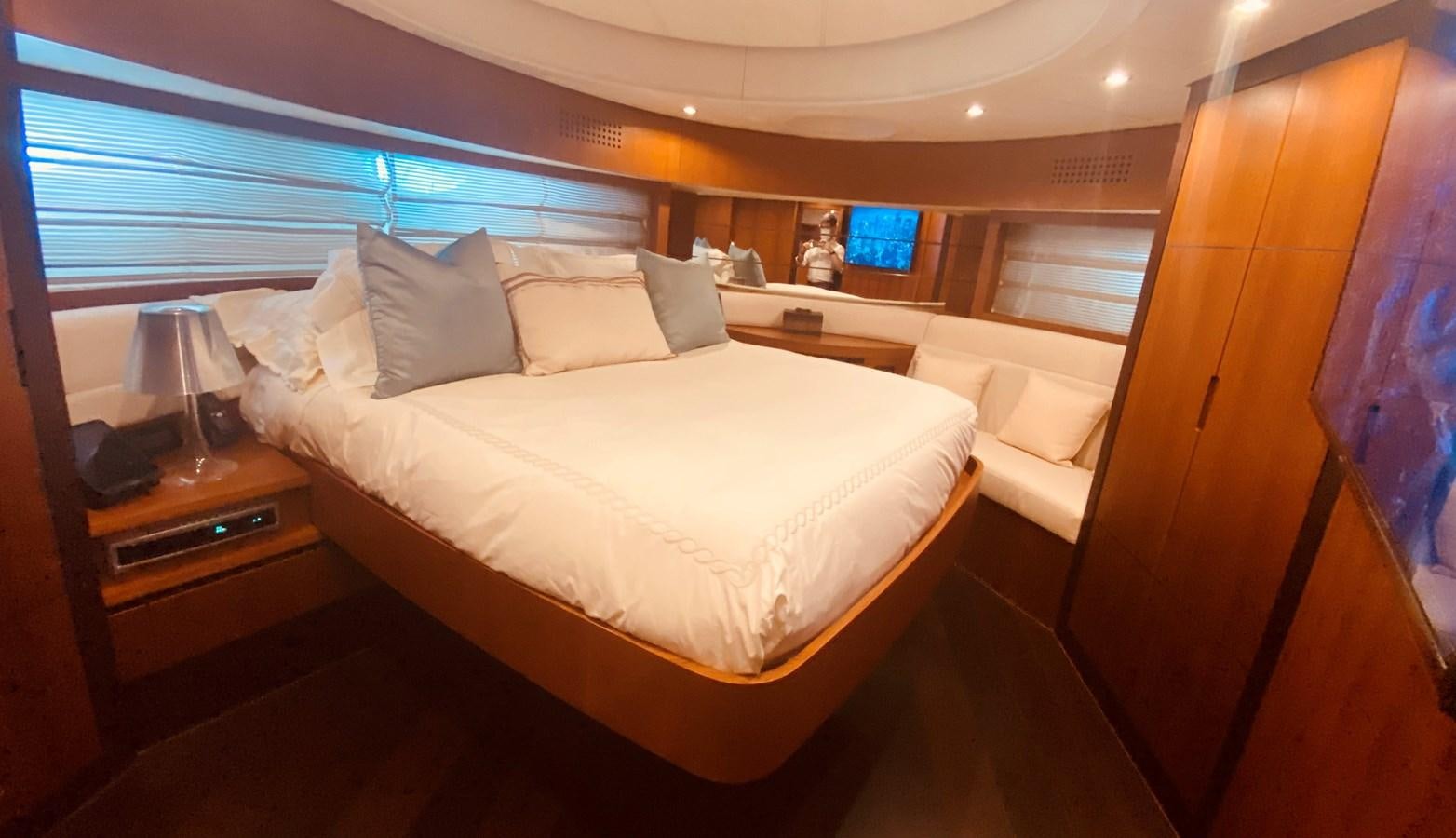 a bed in a room aboard ROMPEMAR Yacht for Sale