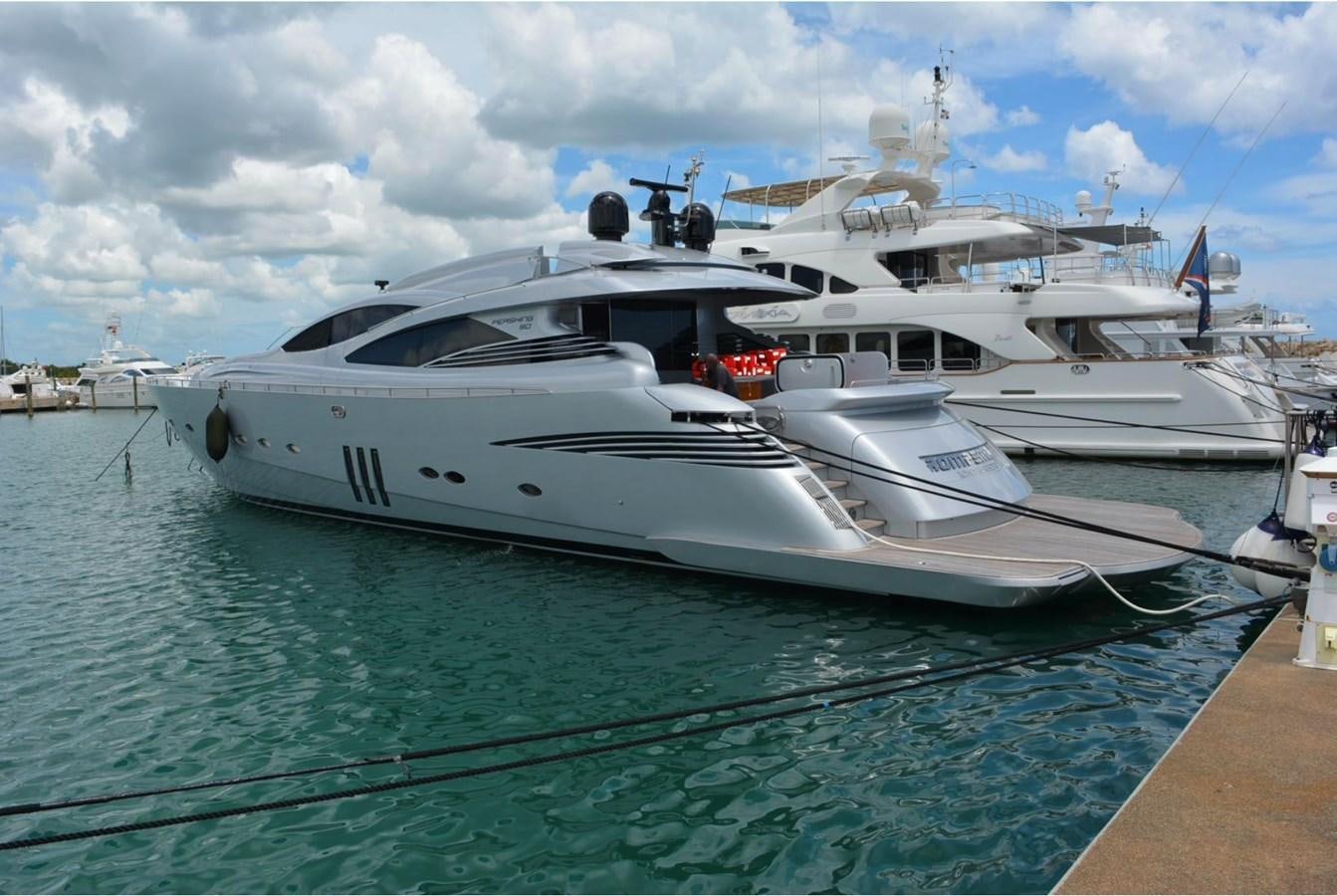 a white yacht docked aboard ROMPEMAR Yacht for Sale