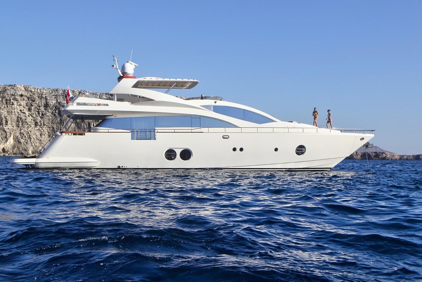 a white yacht in the water aboard SICILIA IV Yacht for Sale