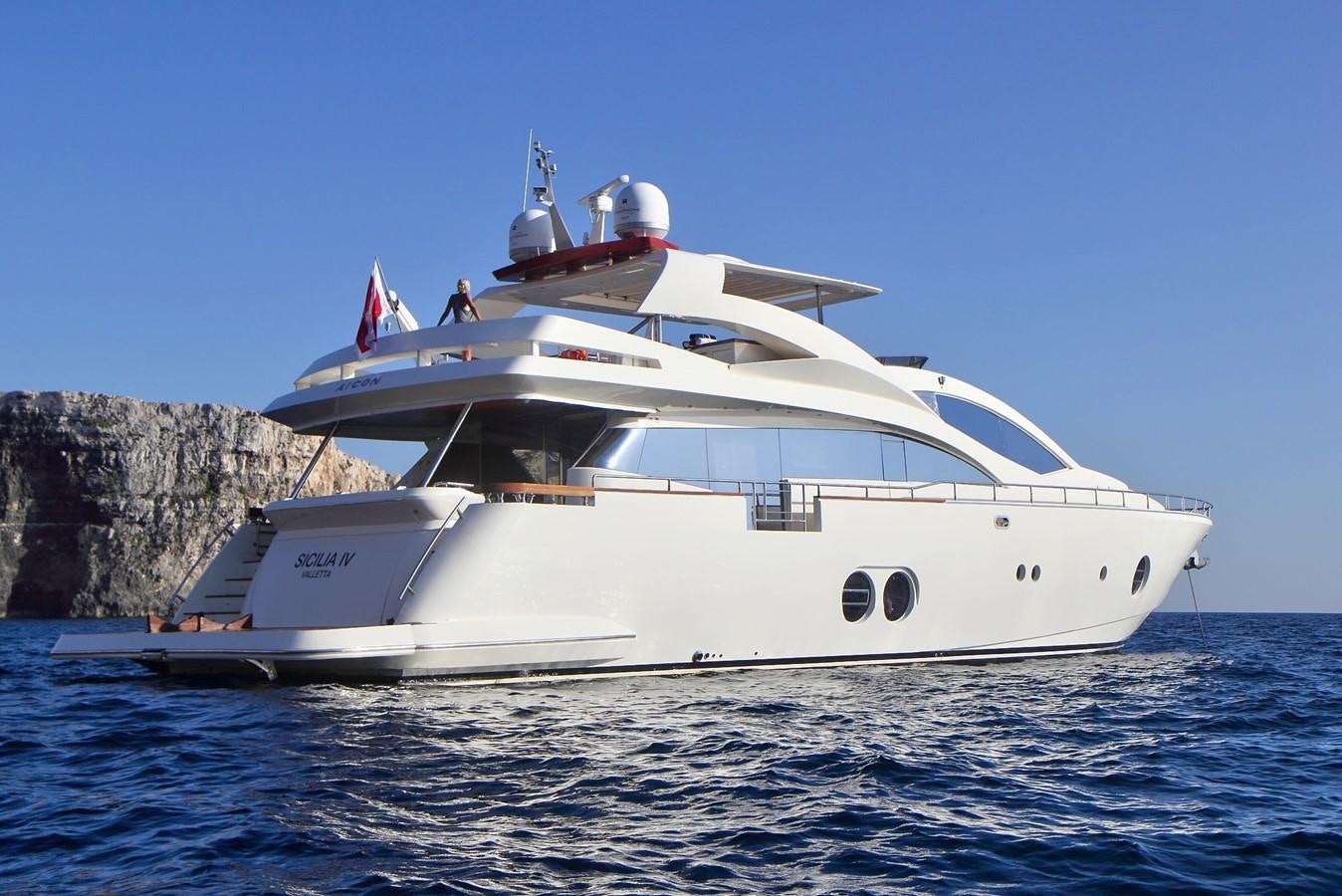 a white boat on the water aboard SICILIA IV Yacht for Sale